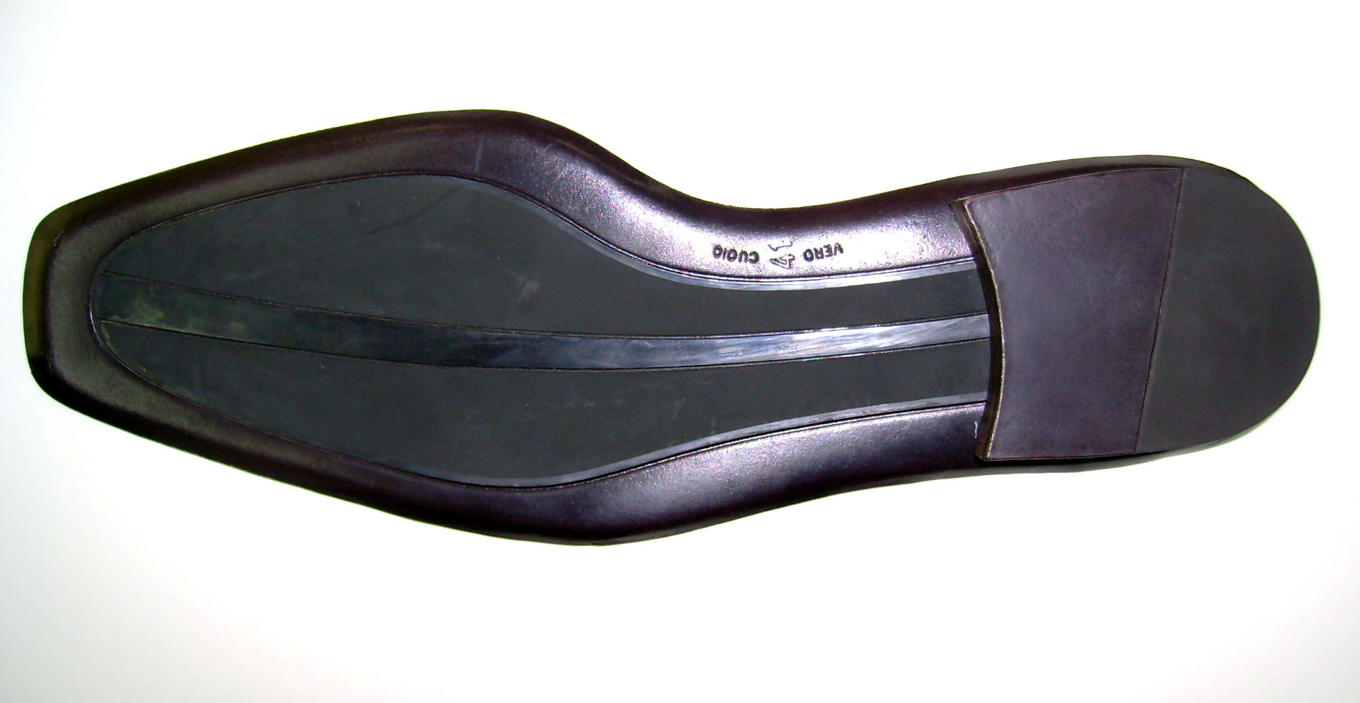 Injected Italy leather sole assembled with leather board heel