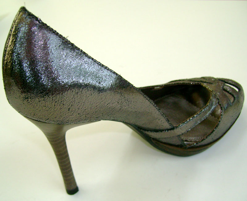 Water-proofed platform and skin-layered heel assembled